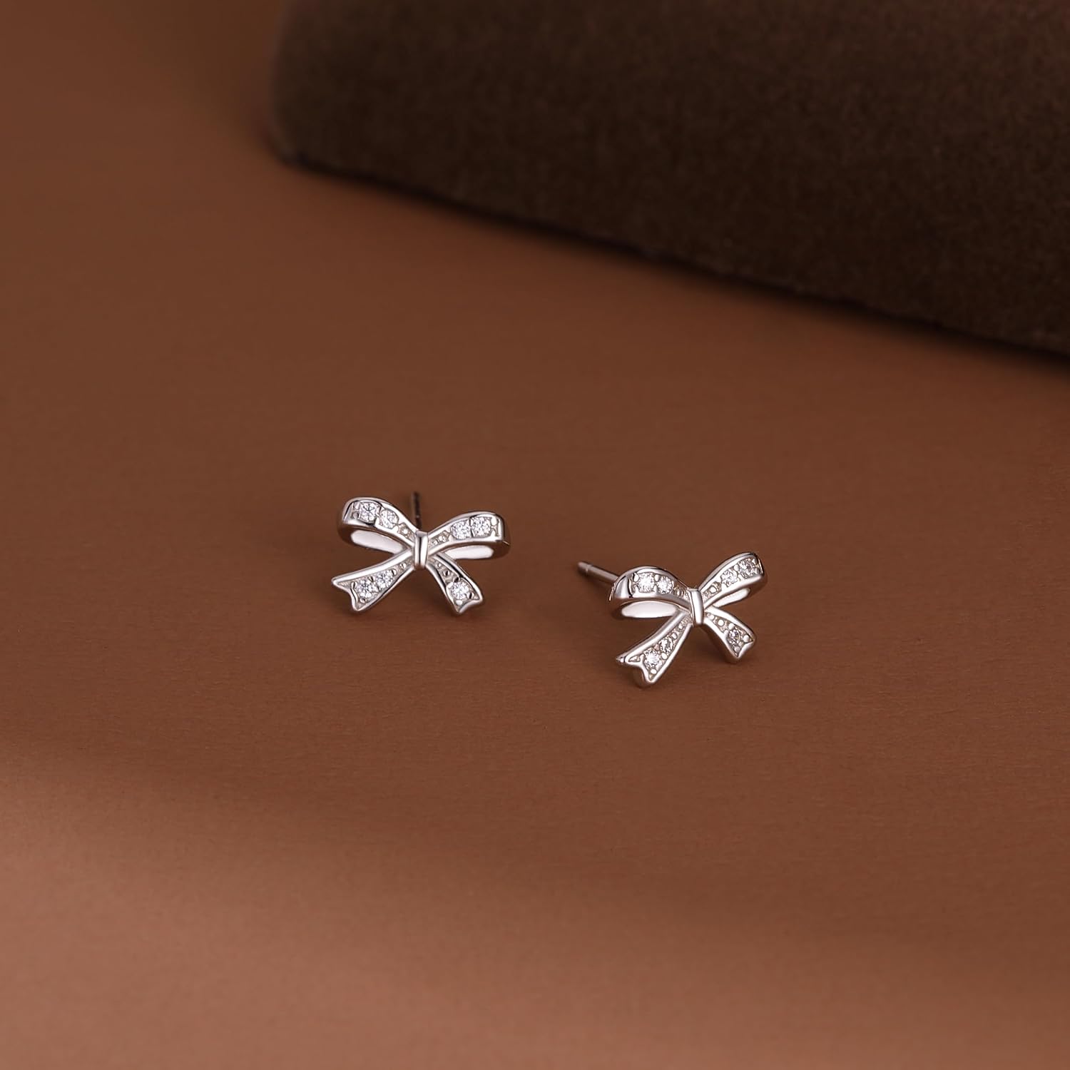 SLUYNZ Solid 925 Sterling Silver Tiny Bow Earrings Stud for Women Teens CZ Bowknot Stud Earrings