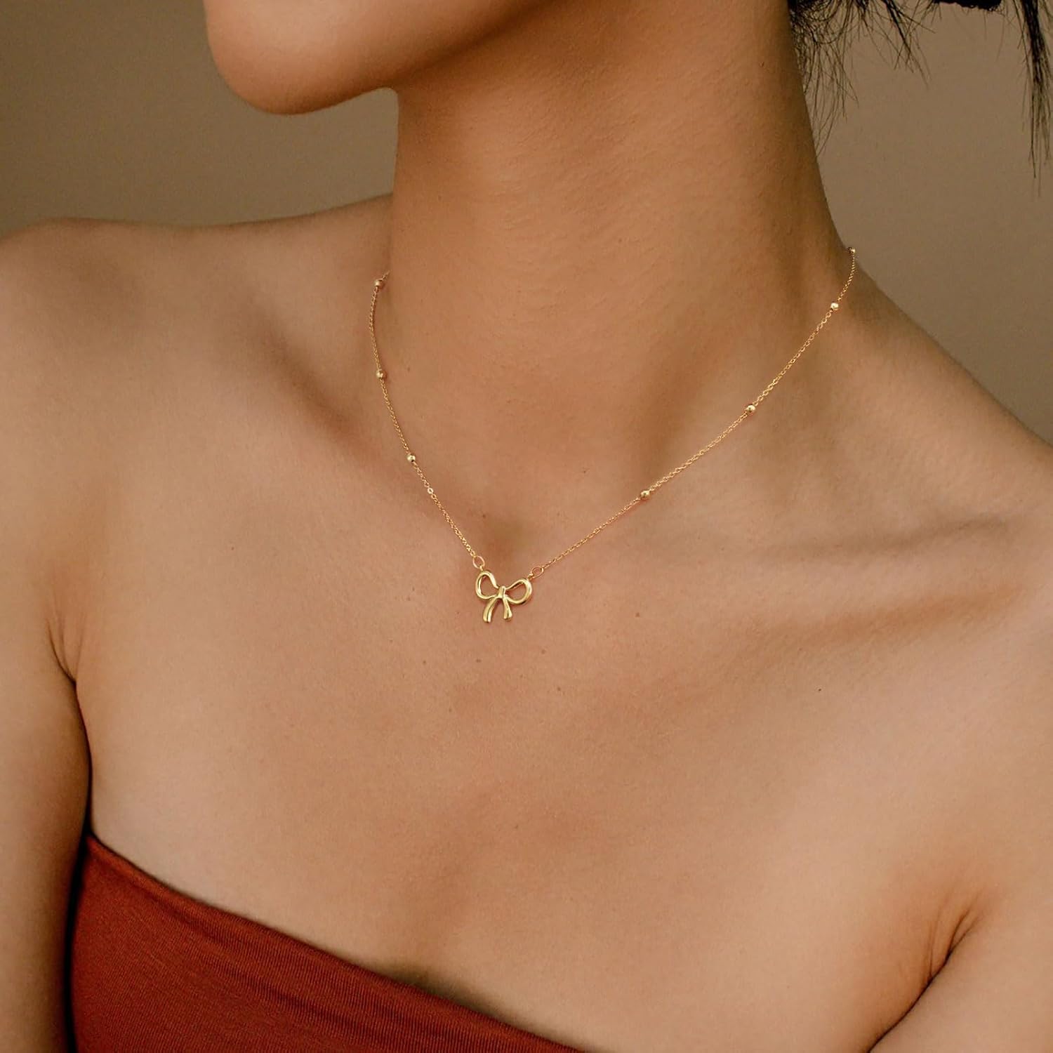 CAROVO Gold Necklace for Women Bow Necklace 14K Dainty Layered Gold Necklace Cute Small Cubic Zirconia Bow Pendant Choker Chain Necklace Trendy Necklace Jewelry Gift for Women
